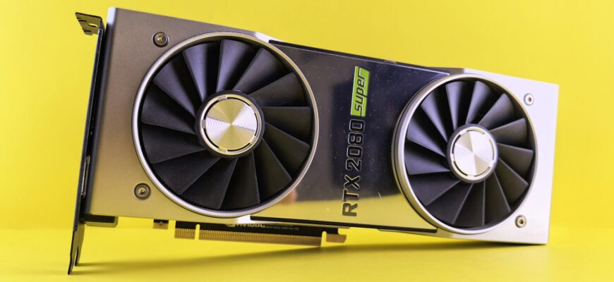 A close up of a video card on a yellow background